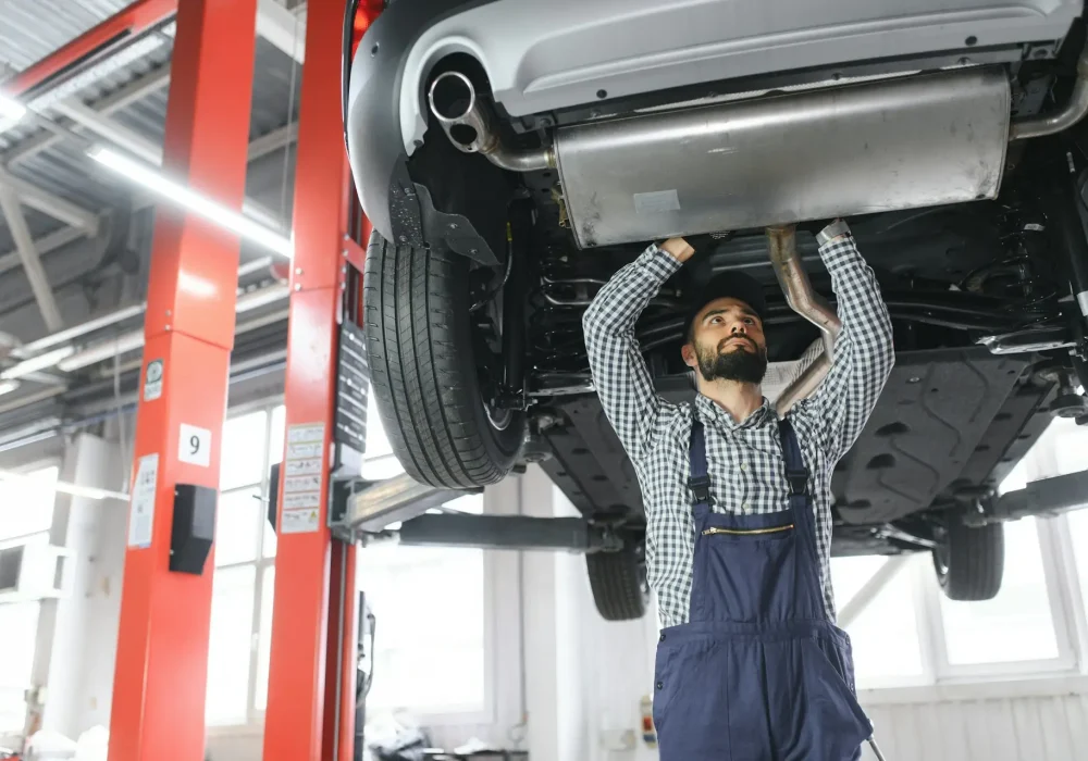 Auto mechanic working at auto repair shop